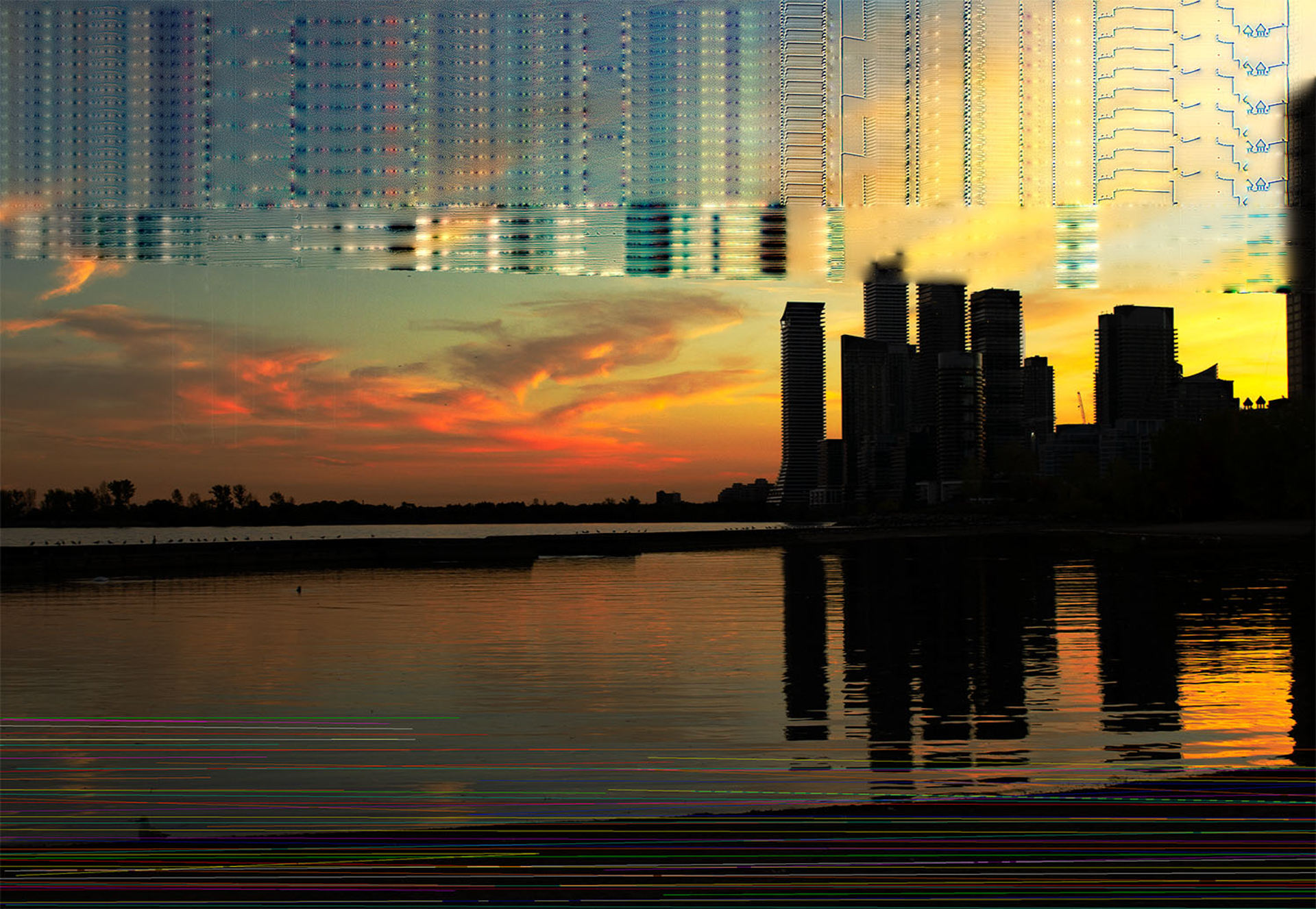 This photo consists of a skyline view of a city during sunset but is distorted by a digital glitch effect over top. The sky is a warm blue, orange, and yellow and the glitch is multicolored.