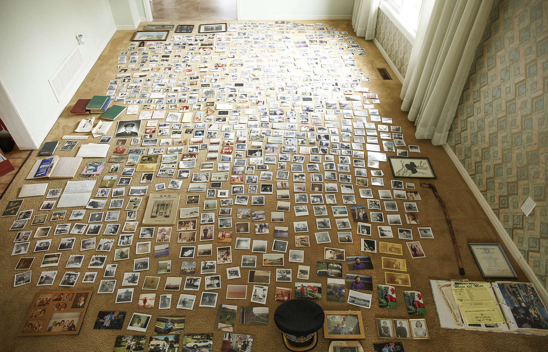 ALL OF HIM: Photograph of archives layed out on the floor